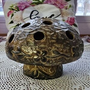 Mushroom pottery floral frog/tea light used.